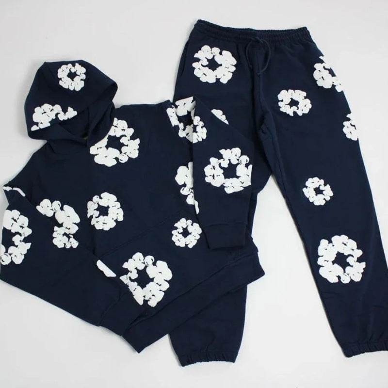 MEELANO Concrete Psalms – Unisex Træningssæt med Blomsterdetaljer Marineblåt jakkesæt