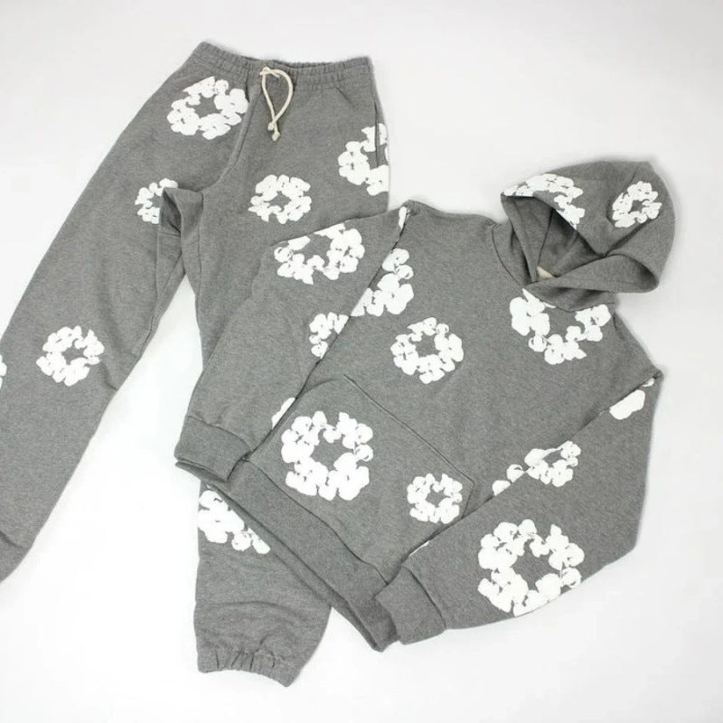 MEELANO Concrete Psalms – Unisex Træningssæt med Blomsterdetaljer Gråt jakkesæt