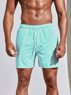 MEELANO Discovery | Stribede badeshorts - Badebukser for komfort og stil cyan