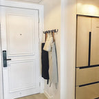 MEELANO Elegant smedejerns vægkrog i bølgeform – moderne og dekorativ opbevaringsløsning til entré, soveværelse eller garderobe