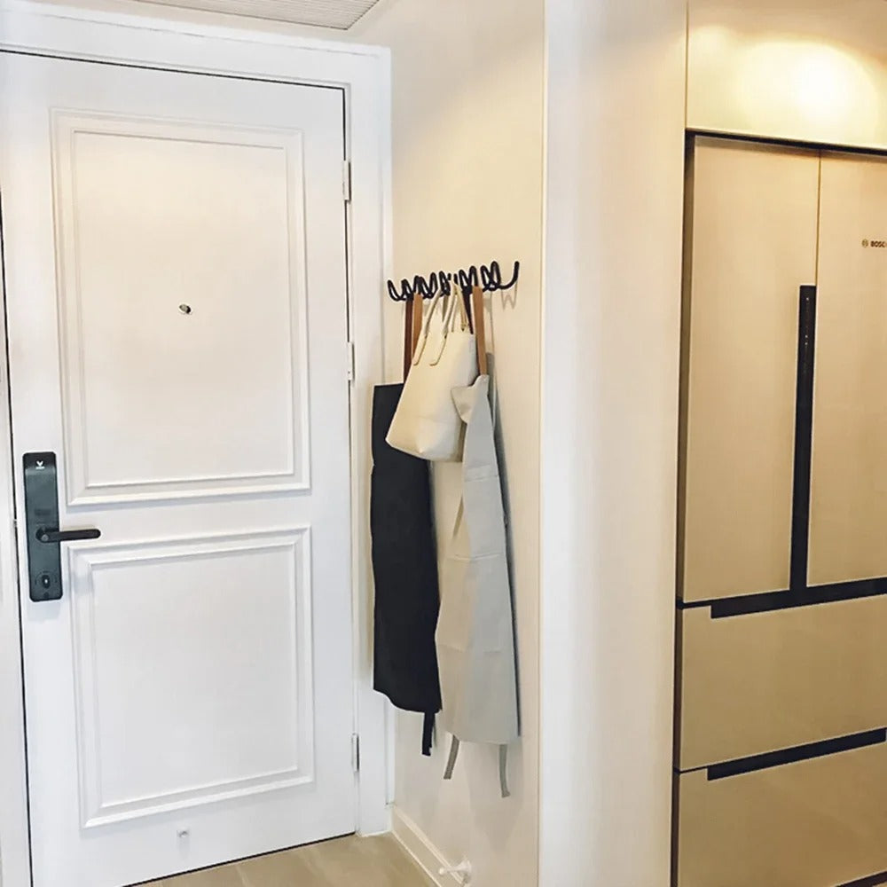 MEELANO Elegant smedejerns vægkrog i bølgeform – moderne og dekorativ opbevaringsløsning til entré, soveværelse eller garderobe